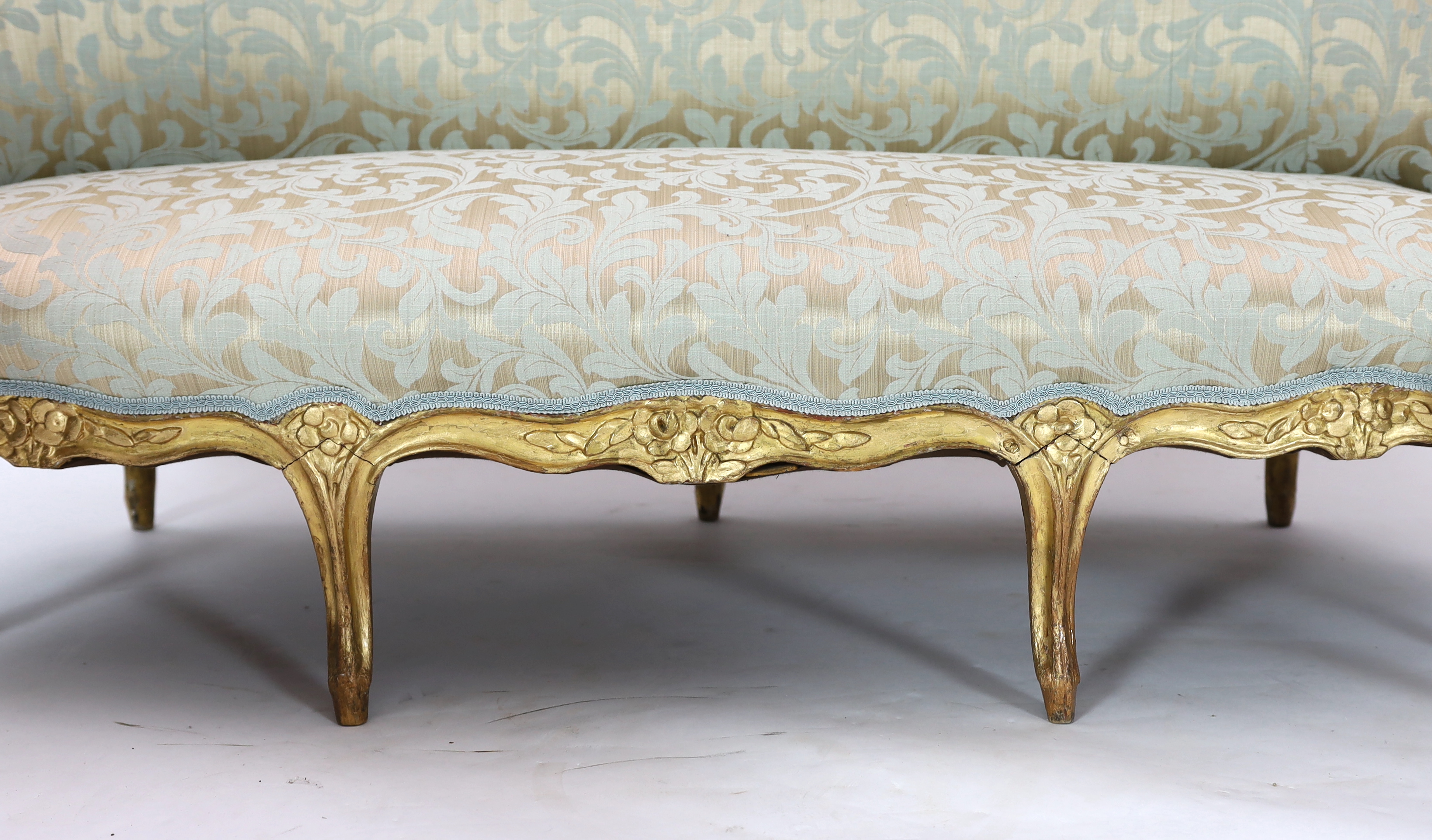 George Jacob (circa 1770-1775), a Louis XVI carved giltwood canapé, 61cm wide, 62cm deep, height 90cm, Please note this lot attracts an additional import tax of 5% on the hammer price